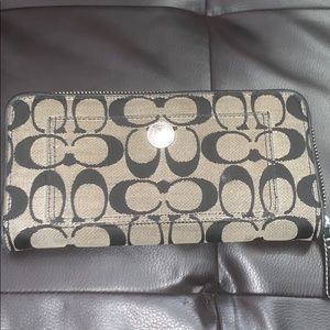 Black and gray coach wallet